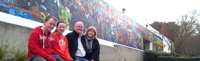 Family picture in front of the mural adjacent to the  Dr Martin Luther King Jr National Historic Site 
